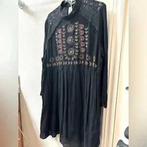 Exhilaration dress in black. Very flattering.
